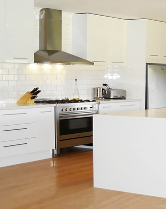 Contemporary Style Kitchen Renovations with Caesarstone Tops and Cabinets with a Gloss Two Pack finish at Victor Harbor, manufactured by Compass Kitchens.